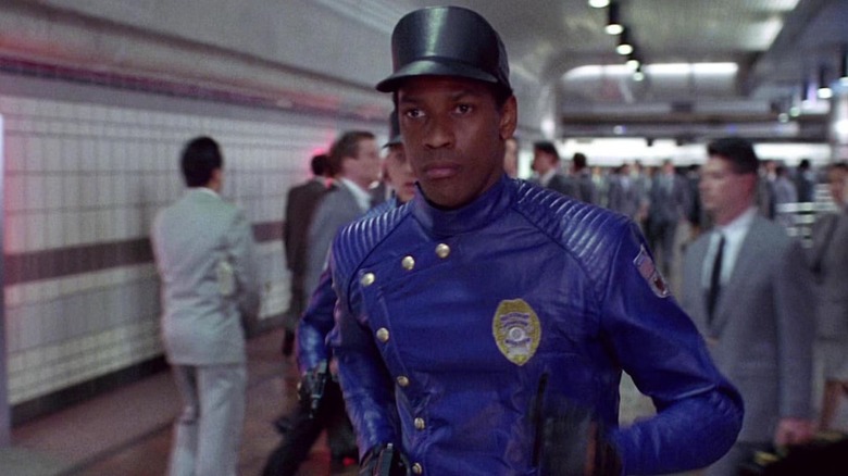 Denzel Washington, as Parker Barnes, is brightly uniformed in Virtuosity's cyberspace