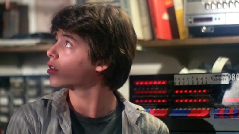 David (Matthew Broderick) looks up from an old computer system in WarGames