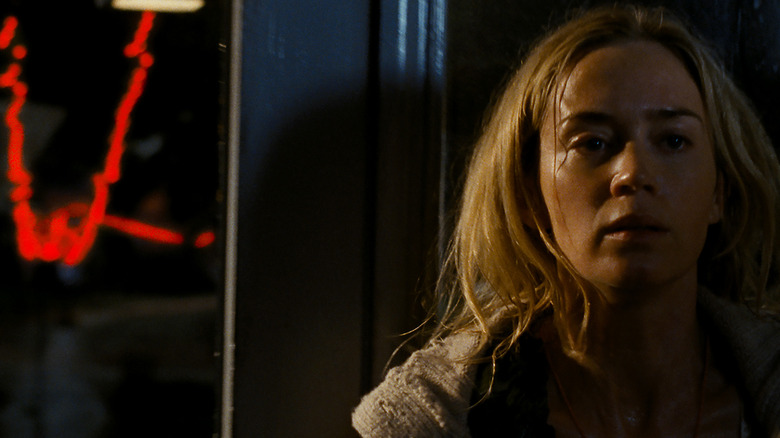 Emily Blunt as Evelyn hiding in A Quiet Place