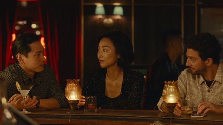 Teo Yoo, Greta Lee, and John Magaro as Hae Sung, Nora, and Arthur in Past Lives