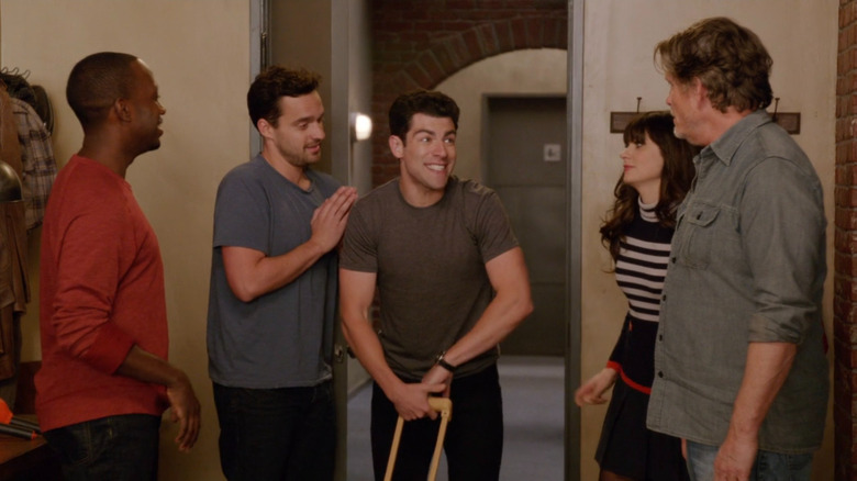 Schmidt leaving the apartment on New Girl