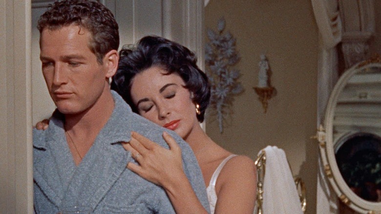 Paul Newman Elizabeth Taylor cuddle Cat on a Hot Tin Roof