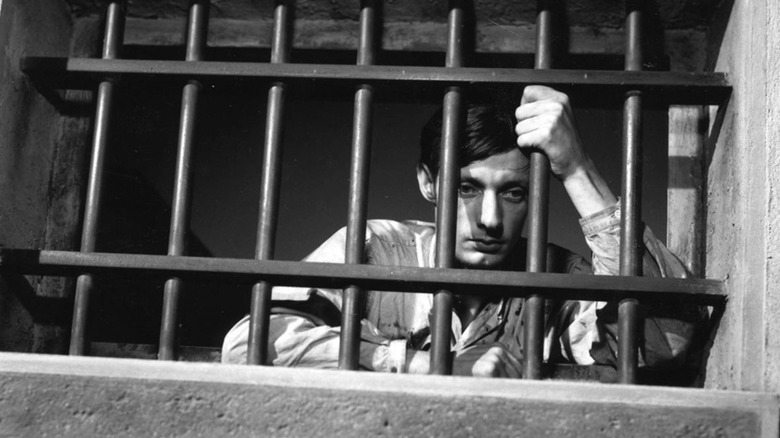 Francois Leterrier as Fontaine behind bars in A Man Escaped