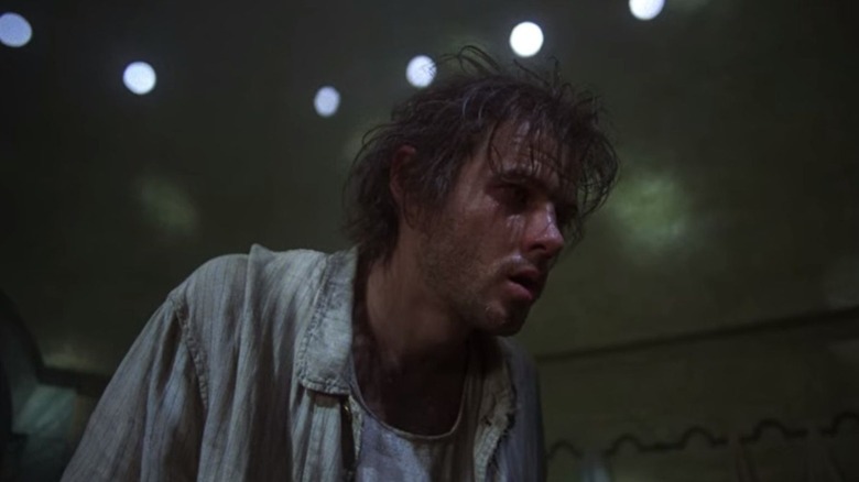 Brad Davis as a tired Billy Hayes in Midnight Express