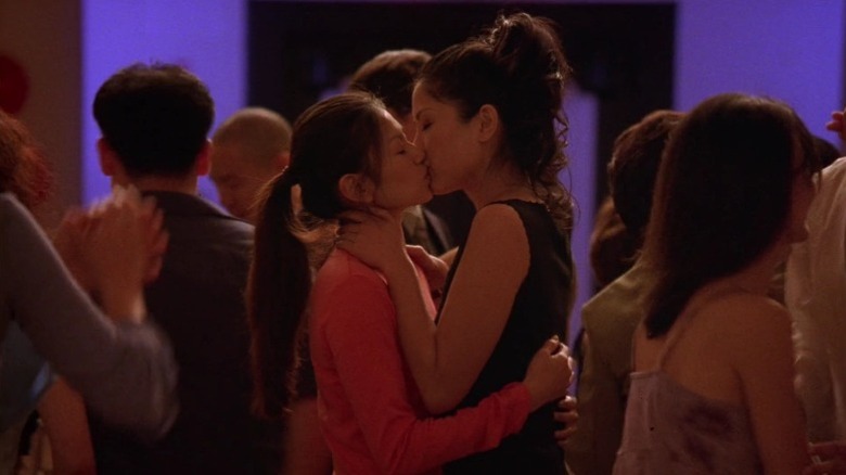 Michelle Krusiec as Wilhelmina Pang and Lynn Chen as Vivian Shing kissing in Saving Face