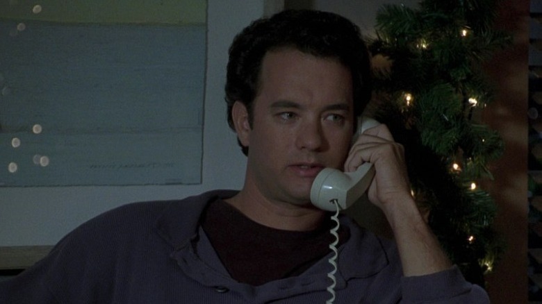 Tom Hanks as Sam Baldwin talking on the phone in Sleepless in Seattle