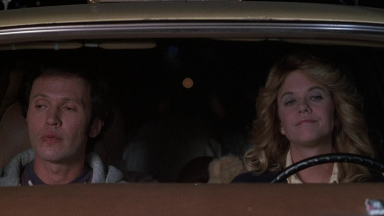 Billy Crystal as Harry Burns and Meg Ryan as Sally Albright driving in When Harry Met Sally...