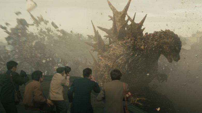 Onlookers get too close to the monster in Godzilla Minus One