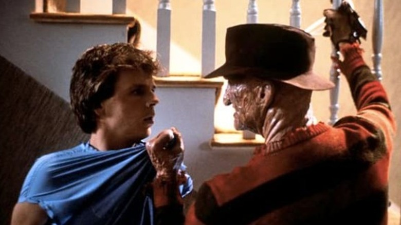 Freddy Krueger grabbing Jesse A Nightmare on Elm Street 2: Freddy's Revenge