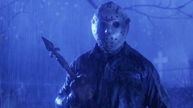 Jason Voorhees holding pike in the rain in Friday the 13th Part VI: Jason Lives