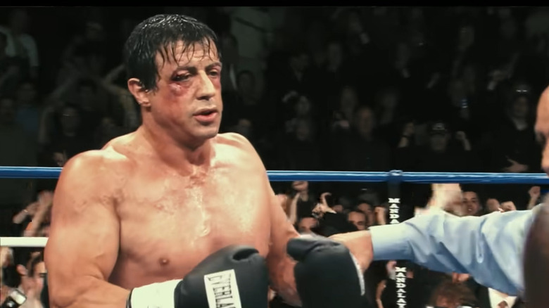 Rocky with his gloves up in the ring in Rocky Balboa