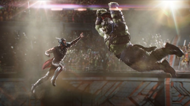 Thor and Hulk leaping toward one another to fight in Thor: Ragnarok