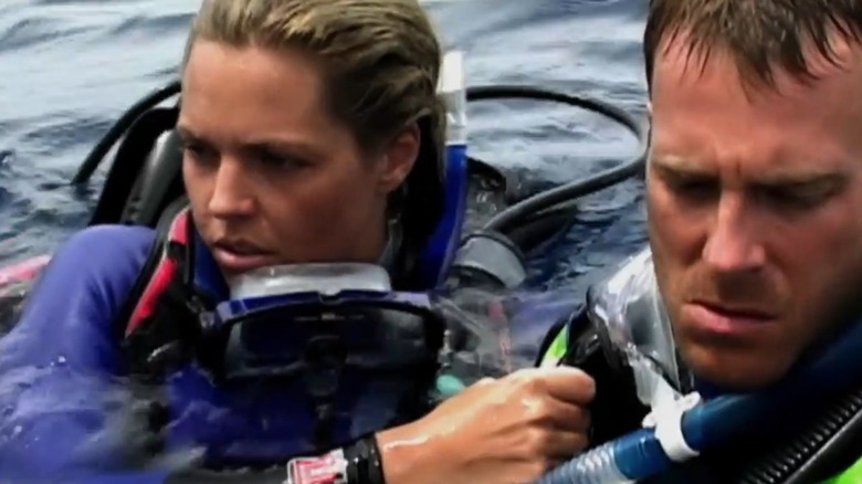 A closeup of Blanchard Ryan as Susan and Daniel Travis as Daniel in Open Water, in their scuba suits