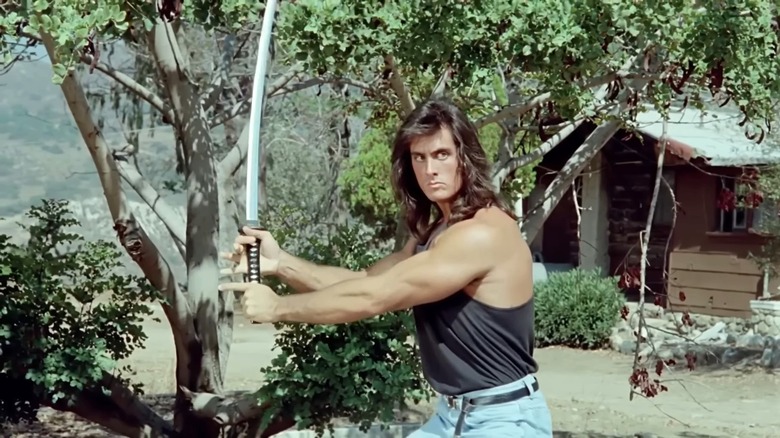 Mathew Karedas as Joe Marshall holding a sword in "Samurai Cop"