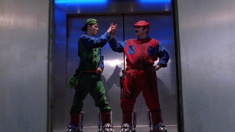 John Leguizamo's Luigi high-fiving Bob Hoskin's Mario in "Super Mario Bros."