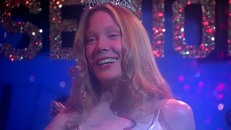 Carrie (Sissy Spacek) is in beautiful white at her prom in Carrie 1974