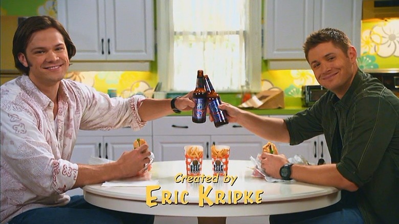 Sam and Dean eating drinking cheersing Supernatural