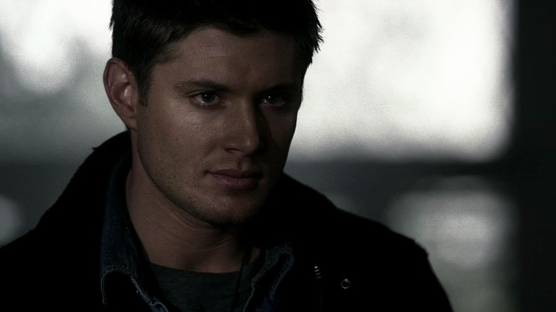 Dean holding up hurt bloody Sam Supernatural