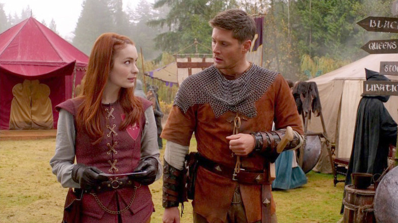 Dean and Charlie walk in Medieval garb Supernatural