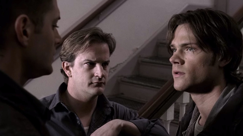 Sam, Dean, and Trickster in stairwell Supernatural