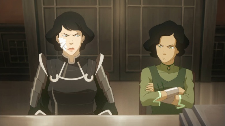Young Lin and Suyin glaring at each other