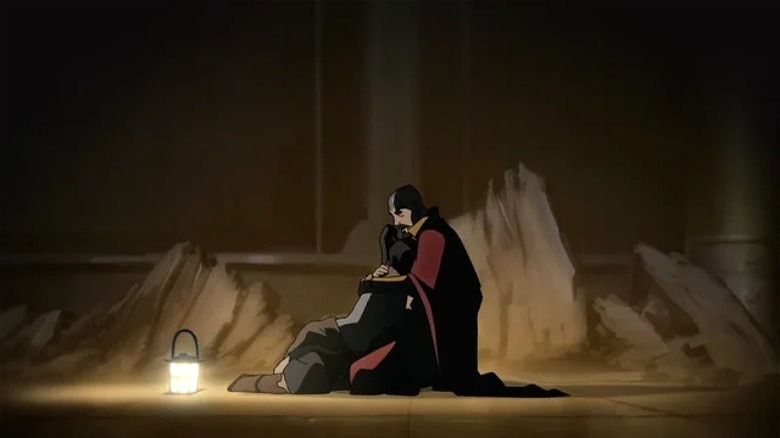 Korra breaking down in Amon's arms