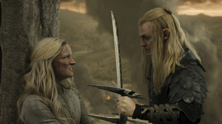 Morfydd Clark as Galadriel and Charlie Vickers as Sauron dueling in the season 2 finale of The Lord of the Rings: The Rings of Power