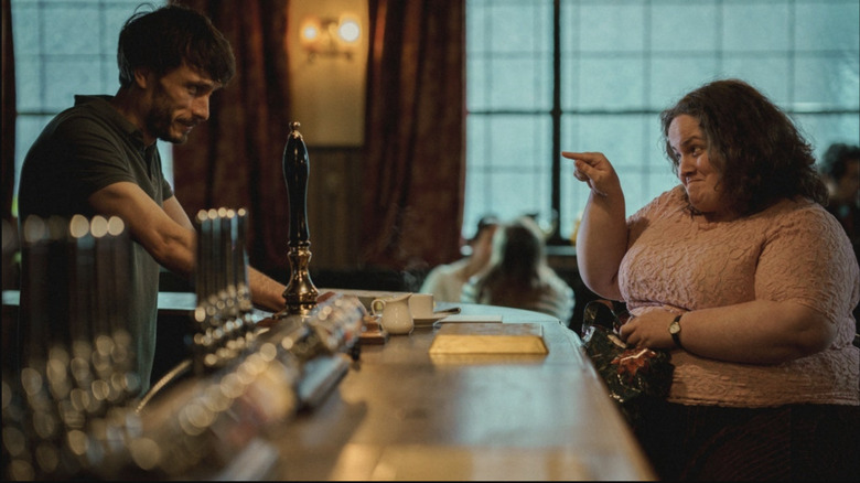 Richard Gadd as Donny Dunn and Jessica Gunning as Martha in the bar in Baby Reindeer