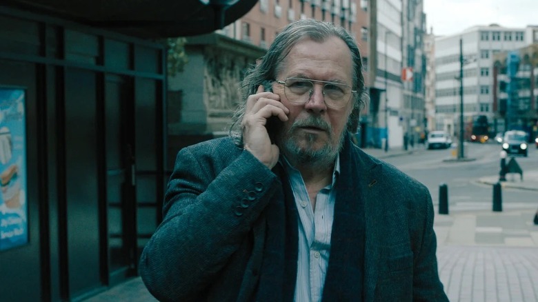 Gary Oldman as Jackson Lamb talking on a phone in Slow Horses