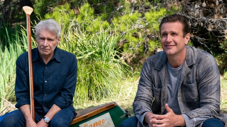 Harrison Ford as Paul and Jason Segel as Jimmy sitting in a canoe on Shrinking