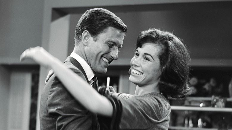 Dick and Laura smiling in The Dick Van Dyke Show