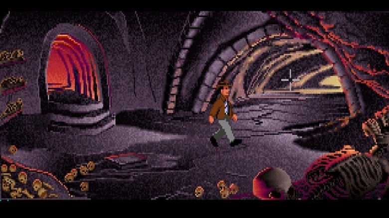 Indiana Jones wanders through a skull filled tomb