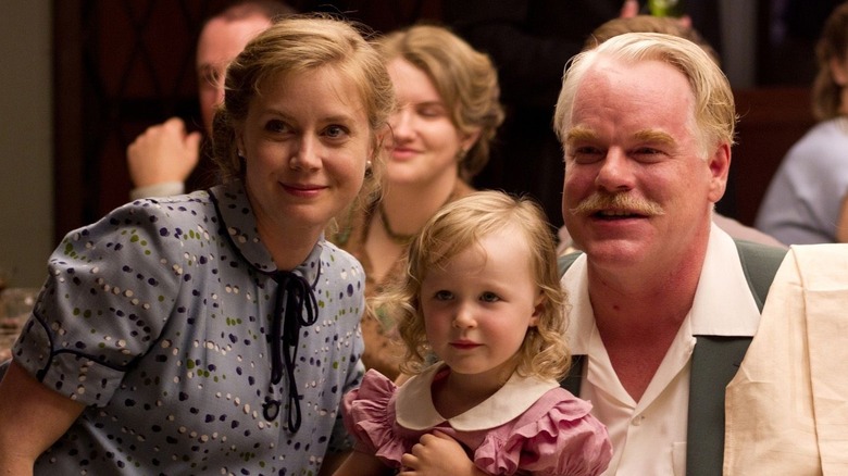 Amy Adams and Philip Seymour Hoffman smiling