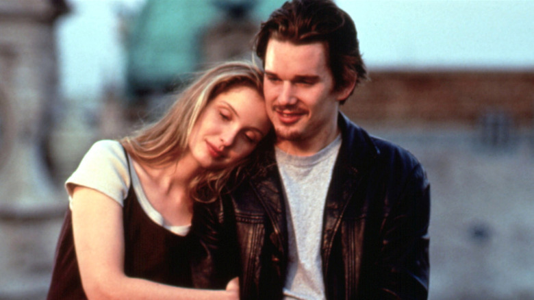 Julie Delpy resting head on  Ethan Hawke's shoulder