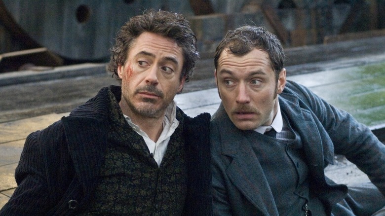Robert Downey Jr. and Jude Law looking surprised