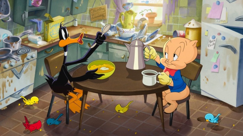 Daffy and Porky having breakfast in the middle of a messy kitchen in The Day the Earth Blew Up: A Looney Tunes Movie