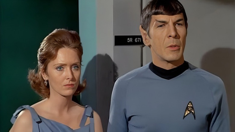 Janice Lester (Sandra Smith) stands next to Spock (Leonard Nimoy) in Star Trek: The Original Series