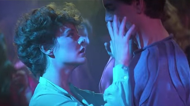 Amy and Jerry dancing closely in "Fright Night"