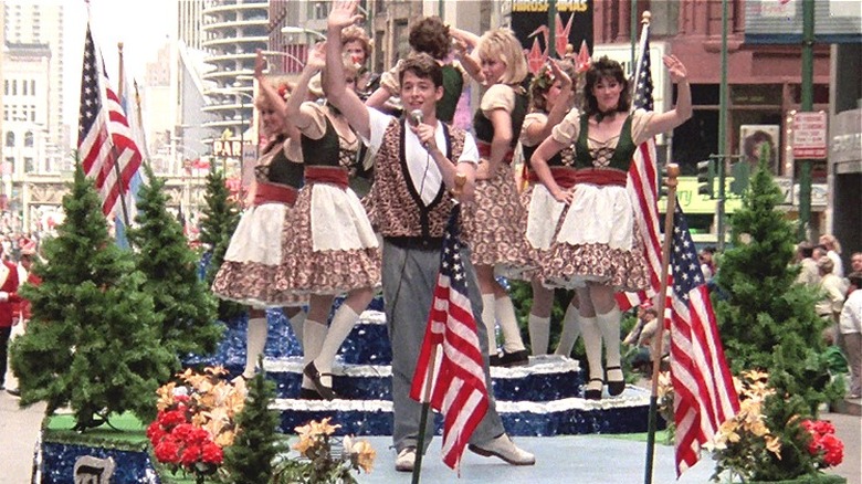 "Ferris Bueller's Day Off" cast on the parade float as Ferris sings