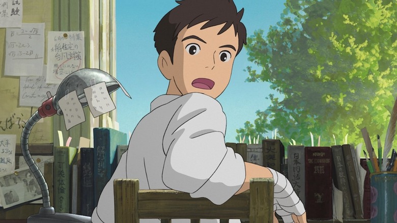 Shun looks back from his desk in From Up on Poppy Hill