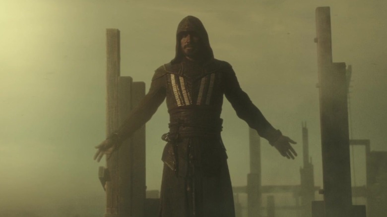 Michael Fassbender as Aguilar de Nerha, preparing a leap of faith in the 2016 Assassin's Creed film