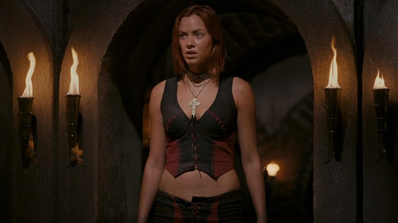 Kristanna Loken as Rayne, standing in a castle in the 2005 BloodRayne film