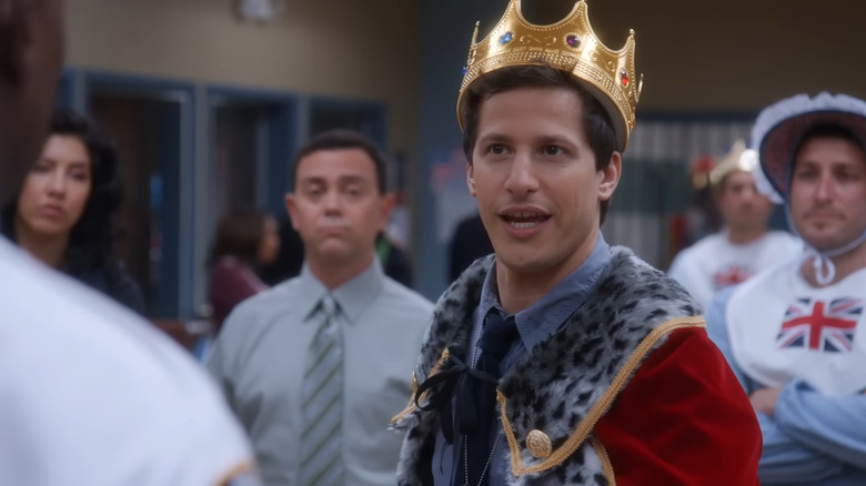 Jake Peralta wearing cape and crown
