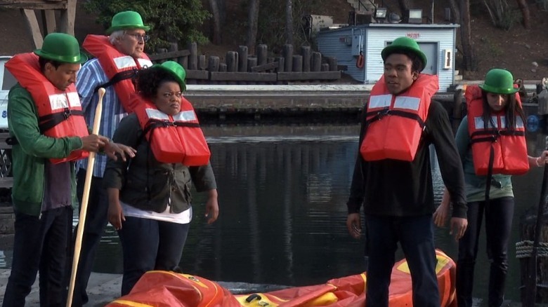 Community characters lifejackets and raft