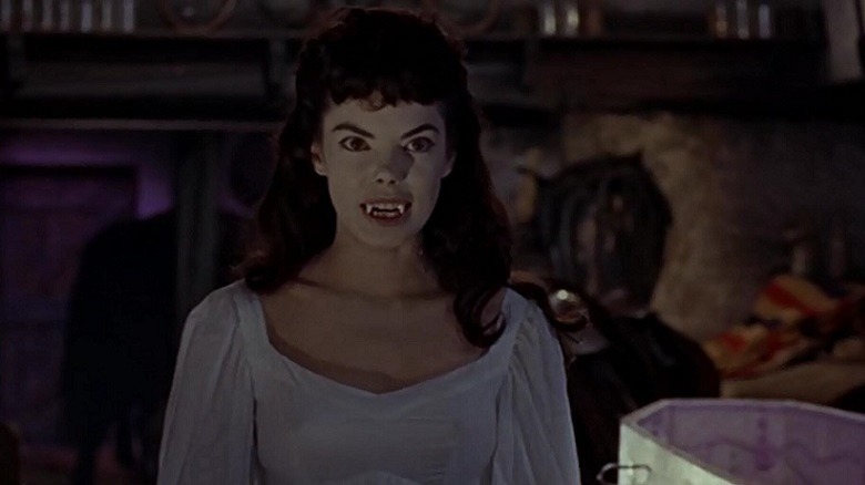 A Bride of Dracula bares her fangs