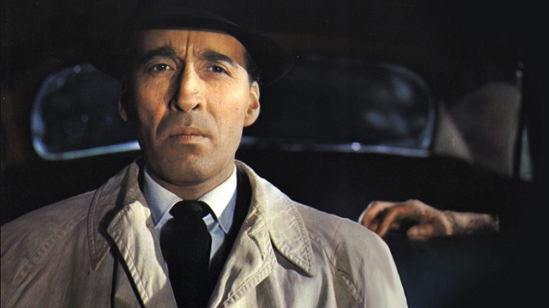 Christopher Lee unaware of a disembodied hand