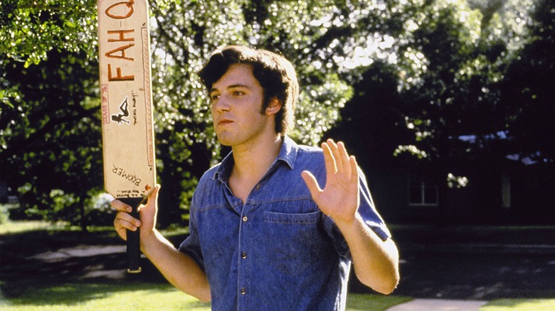 Ben Affleck holding paddle