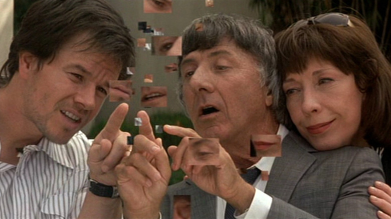 Mark Wahlberg, Dustin Hoffman, and Lily Tomlin all looking at something together