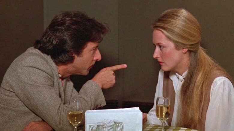 Dustin Hoffman pointing at Meryl Streep