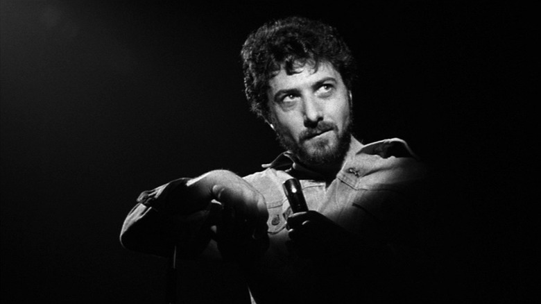 Dustin Hoffman on stage with microphone